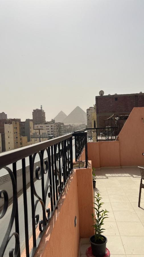 Pyramids Road Guest House Cozy Rooms And Rooftop Breakfast With The Pyramids View Nazlet el-Sîsi Exterior foto
